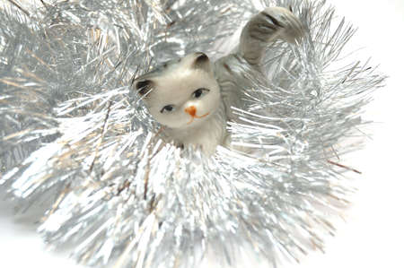 Symbol of New Year 2011 - Cat at metallic color decorationの写真素材