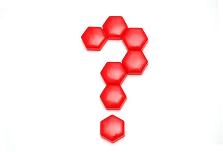 Question mark constructed from red cells isolated on whiteの写真素材