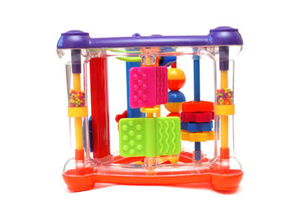Plastic colorful game by Montessori method close-up on whiteの写真素材