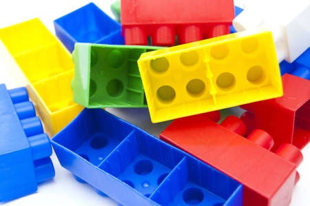 A lot of plastic blocks which are laying in heapの写真素材