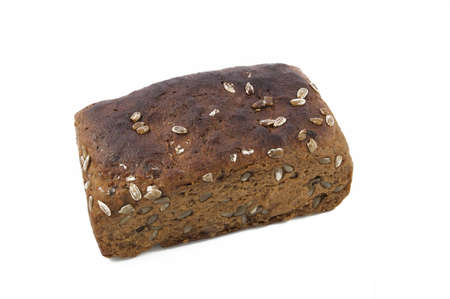 The brick of Brown (rye) bread with sunflower seeds on white backroundの写真素材