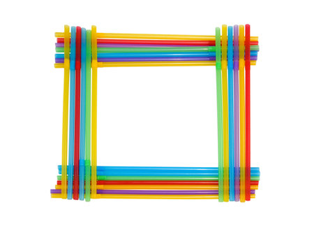 Frame made from many-coloured tubules for cocktail on the white backgroundの写真素材