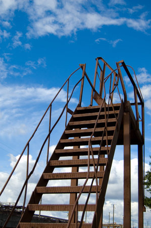 Metalware in shape of stairs to the skyの写真素材