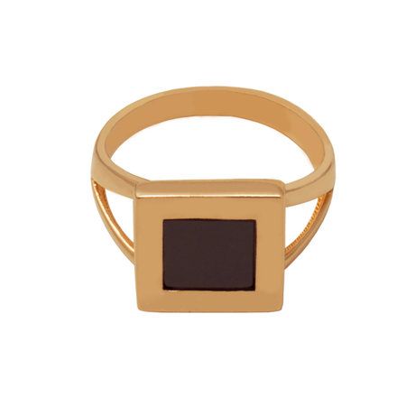 Elegant man golden ring with black square isolated on white backgroundの写真素材