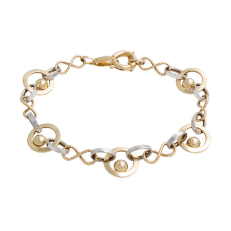 Graceful golden bracelet from white and yellow gold isolated on white backgroundの写真素材