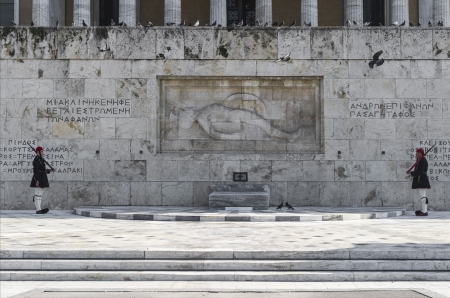 ATHENS, GREECE - March 25  Evzones  presidential ceremonial guards  guarding the Tomb of the Unknown Soldier at the Hellenic Parliament Building, March 25, 2011 in Athens, Greece  のeditorial素材