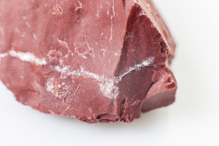 red natural stone in white backgroundの写真素材