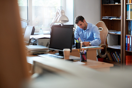 Businessman hard at work in an office