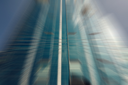 Defocused image of a glass skyscraper in the cityの写真素材