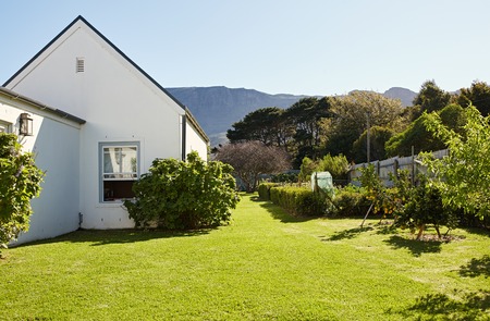 Exterior of a country house and backyard in the summerの写真素材