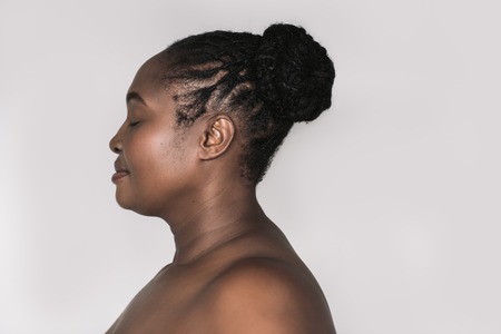 Profile of a young African woman with beautiful skin