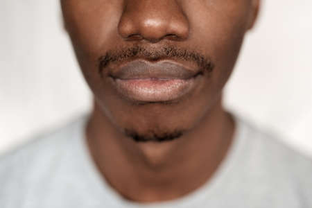 Closeup of the lower half of an African mans faceの写真素材
