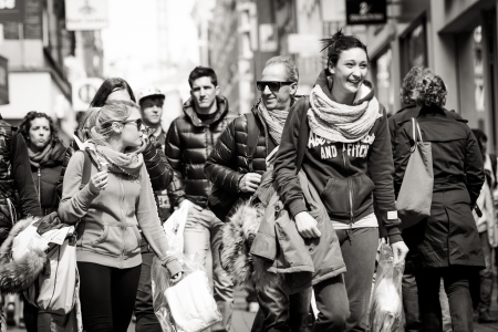 smiling woman in the crowd on the street. Black and white. Netherlands, Amsterdamのeditorial素材