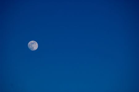 full moon on navy blue skyの写真素材