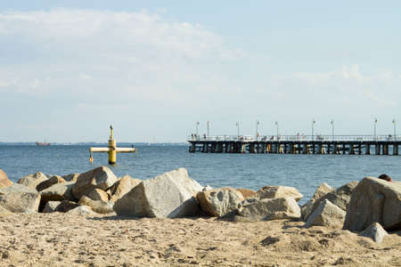 Gdynia beach with a breakwater made of stones