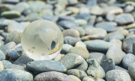 Earth transparent glass with stoneの写真素材