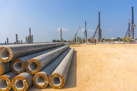 Piling work at construction site with blue skies 