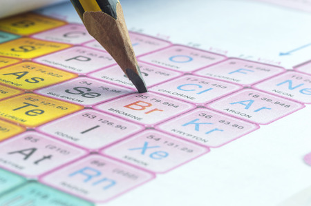 Pencil with periodic table close upの写真素材