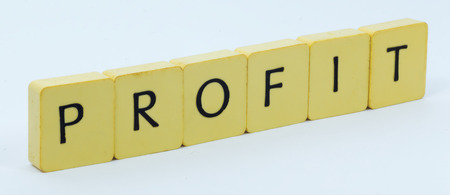 Yellow profit cube with white backgroundの写真素材