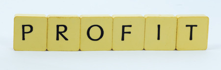 Yellow profit cube with white backgroundの写真素材