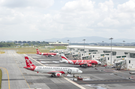 KUALA LUMPUR, MALAYSIA -  DECEMBER 10, 2014:Air Asia Airplanes at KLIA2 airport. Air Asia is a fast growing low cost carrier based in Malaysia.のeditorial素材
