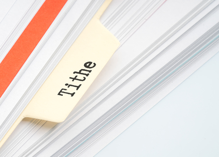 Paper filing with conceptual taxed text.の写真素材