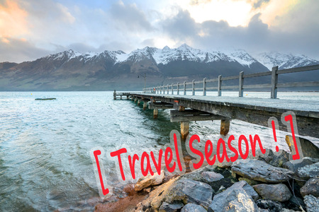 Wooden jetty with mountain at Glenorchy lake, New Zealand.の写真素材