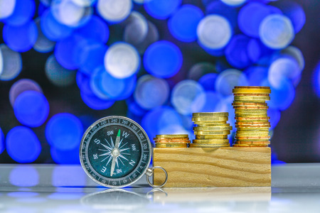 Coins with light bokeh backgroundの写真素材