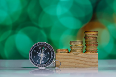 Coins with light bokeh backgroundの写真素材