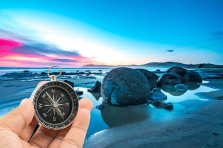 Compass with landscape backgroundの写真素材