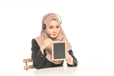 Hijab woman hold black board with education concept.の写真素材