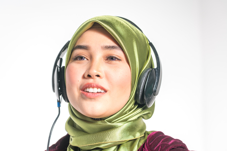 Veiled teenager and headset with entertaiment concept.の写真素材