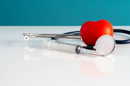 Stethoscope and heart toy with medical concept.