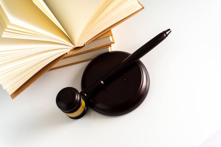 Gavel hammer and book with legally concept.