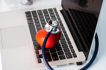 Stethoscope and heart toy with medical concept.の写真素材