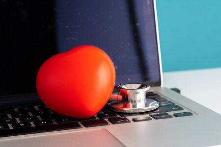 Stethoscope and heart toy with medical concept.の写真素材