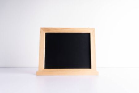 View of blurred black board and white background with educational concept.の写真素材