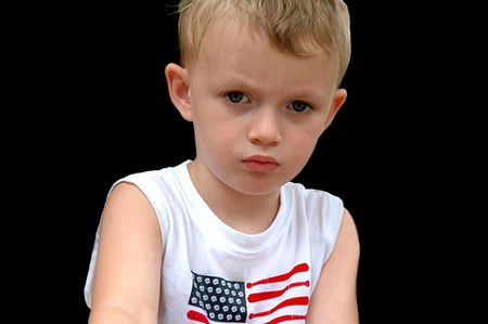 Unhappy little boyの写真素材