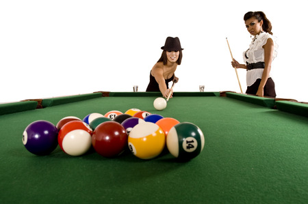 Two beautiful models play pool / billiards