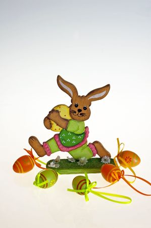 Easter bunny and colorful painted eggsの写真素材