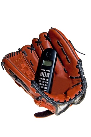baseball glove with the phone on the white background の写真素材