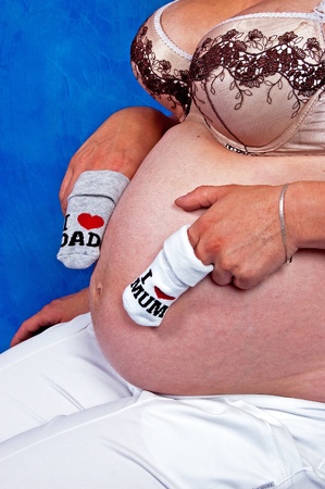 Woman in advanced pregnancy with childrenの写真素材