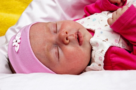 sleeping baby with bandage on headの写真素材