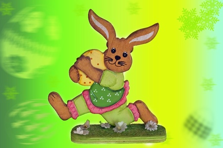 Rabbit with egg on Christmas backgroundの写真素材
