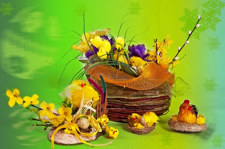 Easter basket with a theme flower on a white backgroundの写真素材