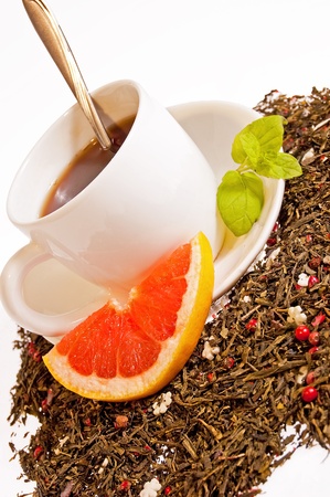 Hot tea cup with lime and fresh mintの写真素材