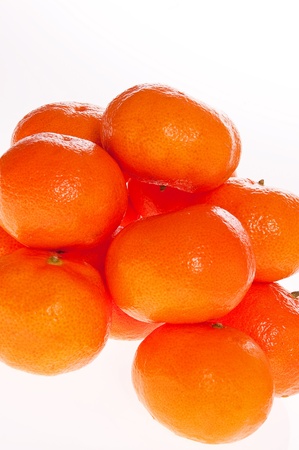 Ripe tangerines on white backgroundの写真素材