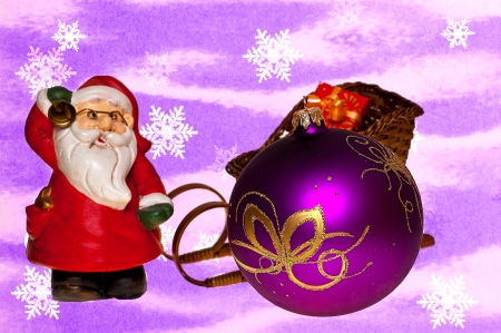 Christmas decoration with baubles on a Christmas tree and Santa Claus figurineの写真素材