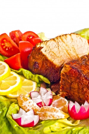 Roast with vegetables on a white backgroundの写真素材