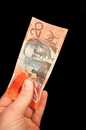 Holding Australian $20 billの写真素材